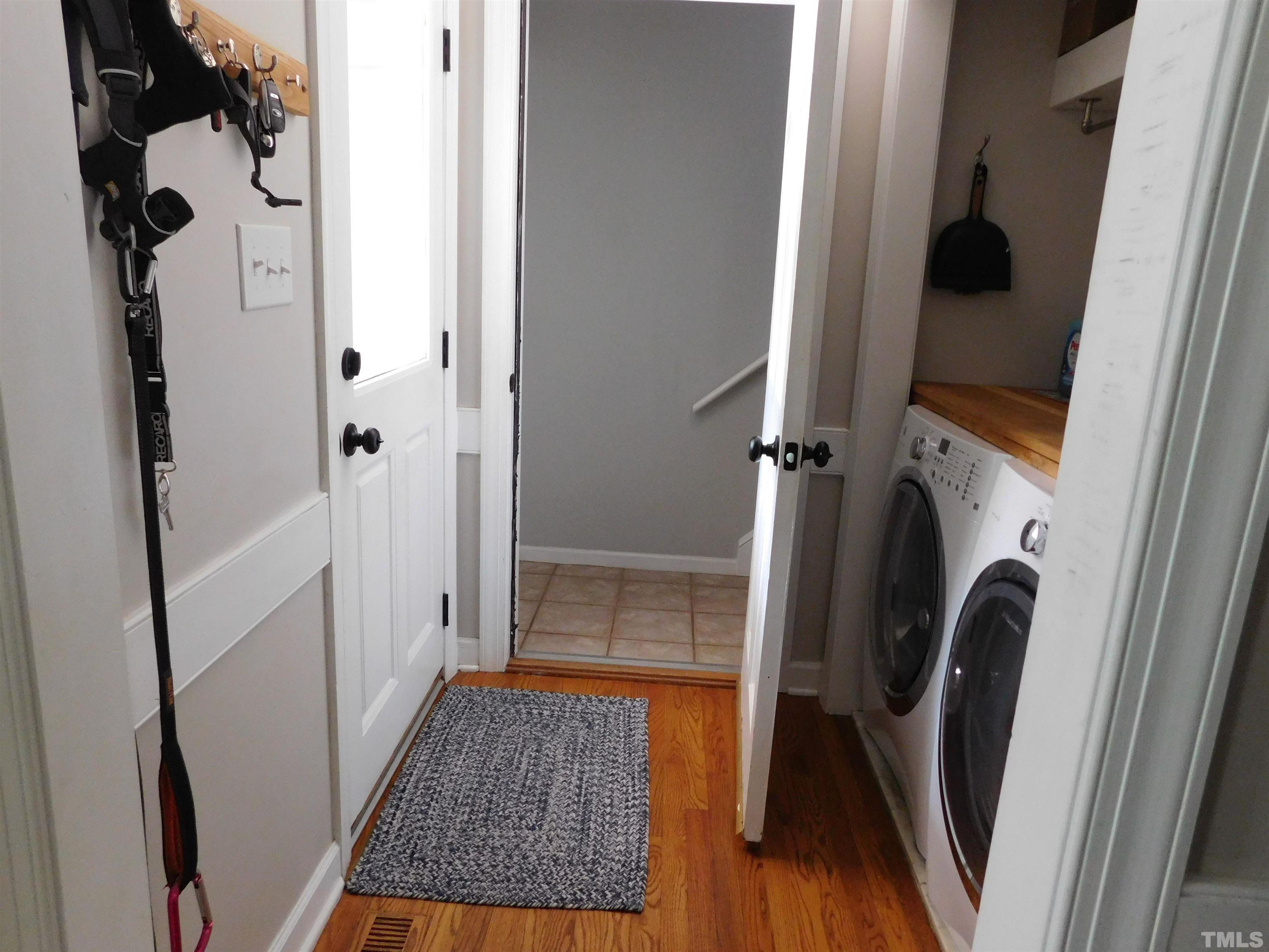 11417 Pacesferry Drive Raleigh, NC 27614 - Photo 12 of 39 a view of walk in closet with wooden floor and shower