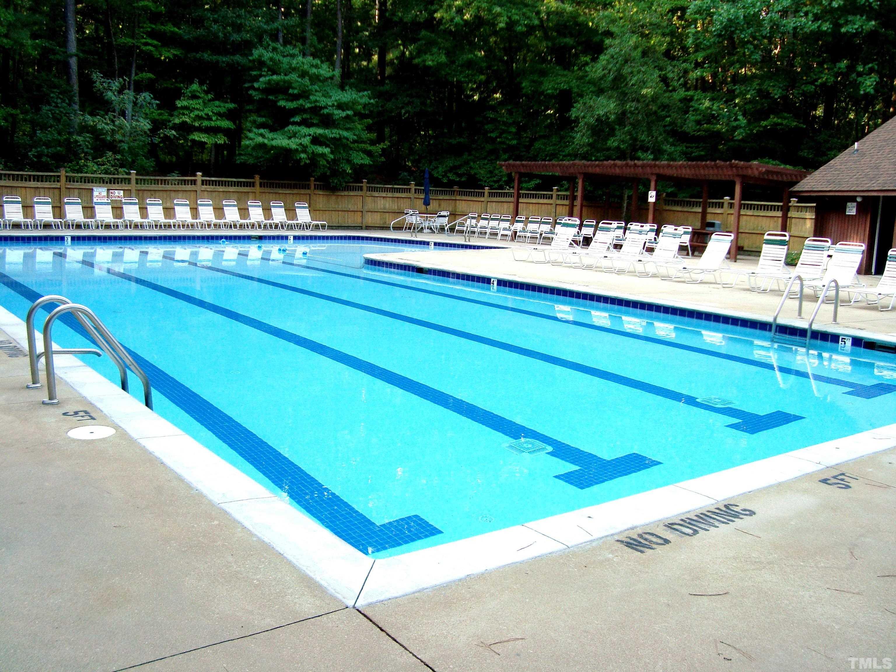 11417 Pacesferry Drive Raleigh, NC 27614 - Photo 36 of 39 a view of swimming pool with a patio