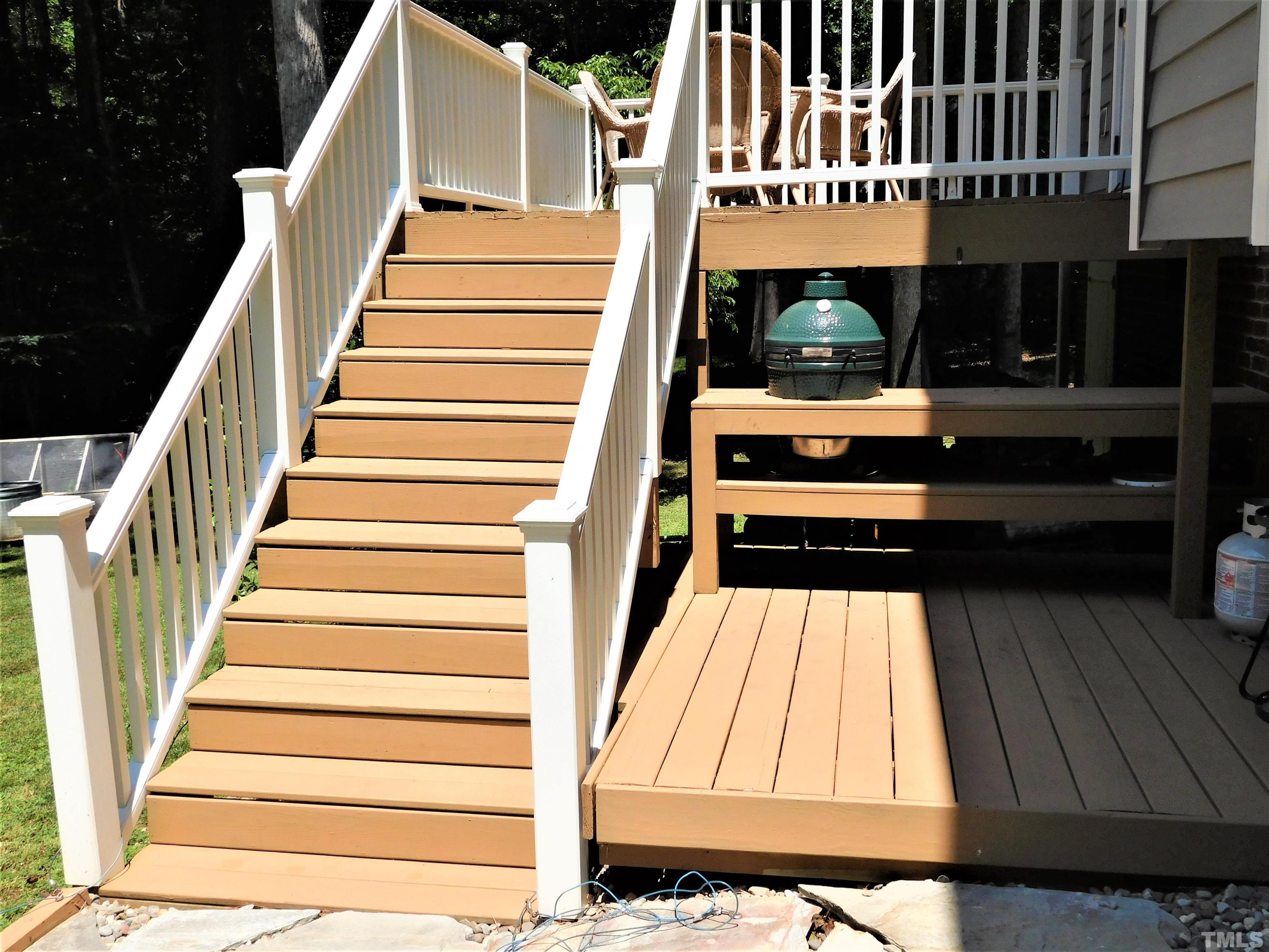 11417 Pacesferry Drive Raleigh, NC 27614 - Photo 8 of 39 a view of outdoor space deck and kitchen