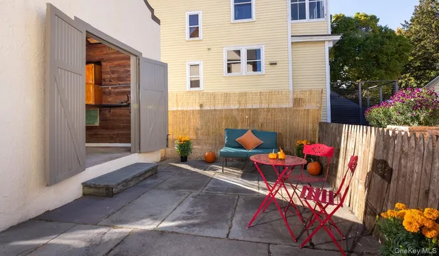 a view of a street with an outdoor space