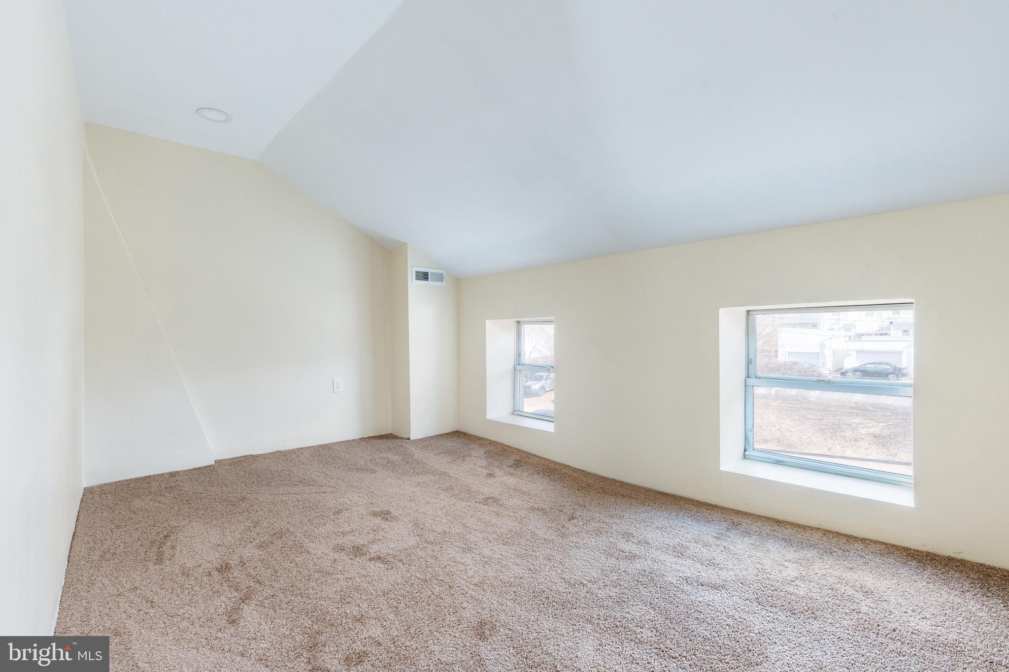 4664 Canton Street Philadelphia, PA 19127 - Photo 24 of 32 an empty room with windows