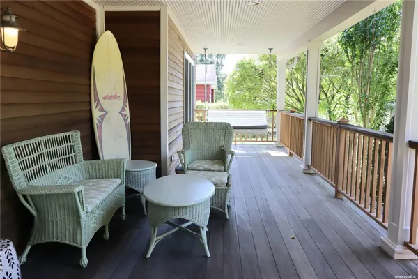 a outdoor living space with furniture and a window