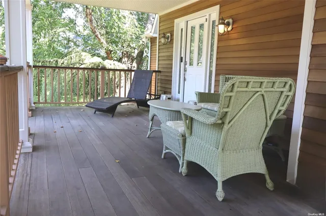 a view of a livingroom with furniture and a fireplace