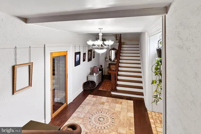 a room with lots of chairs and a table