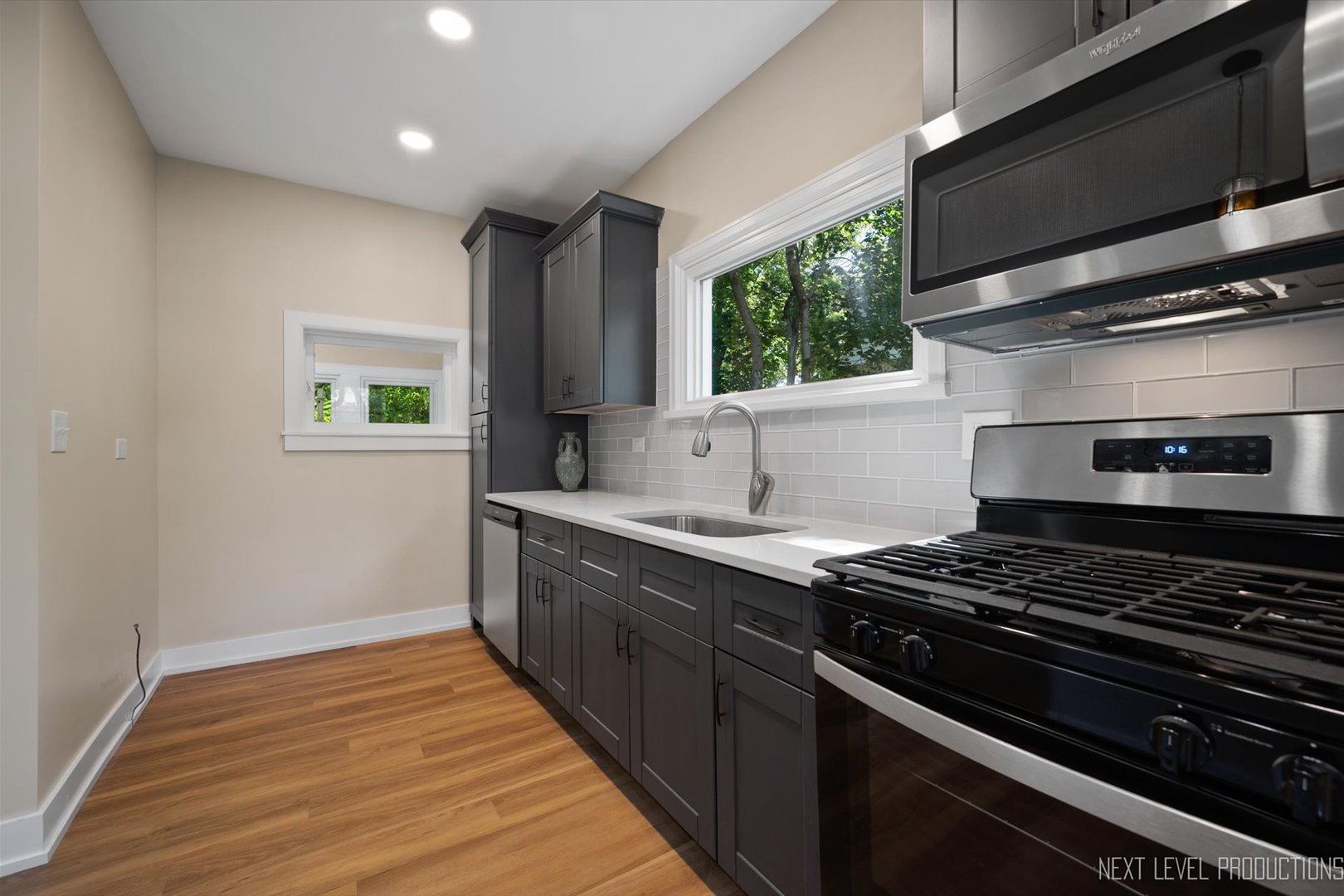 201 South Gilbert Street South Elgin, IL 60177 - Photo 11 of 27 a kitchen with a stove and a sink