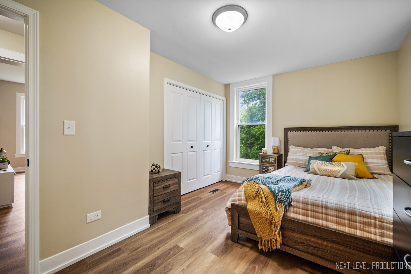 201 South Gilbert Street South Elgin, IL 60177 - Photo 14 of 27 a bedroom with a bed and wooden floor