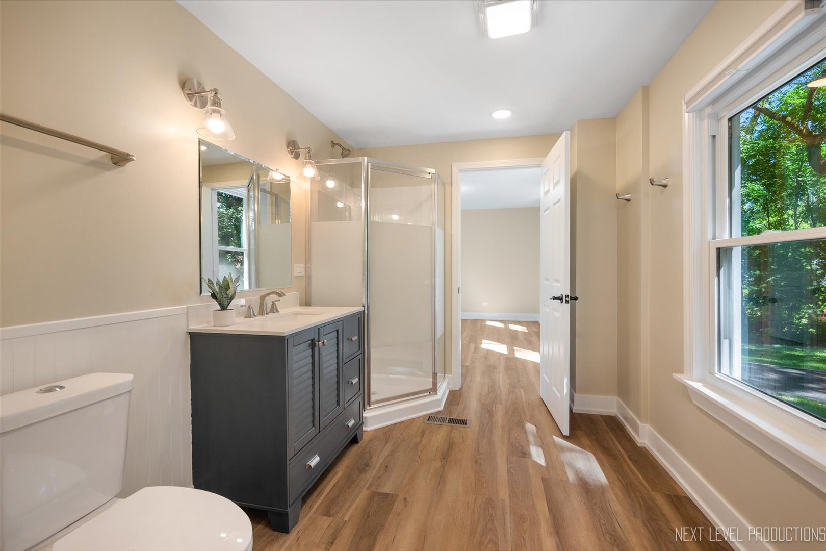 201 South Gilbert Street South Elgin, IL 60177 - Photo 16 of 27 a bathroom with a double vanity sink toilet and shower
