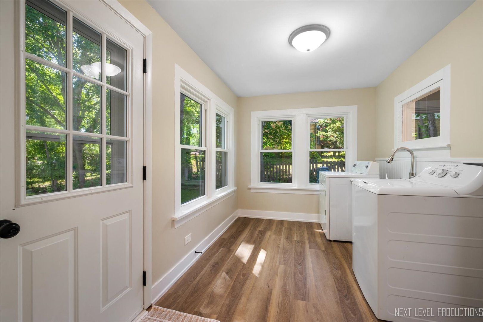 201 South Gilbert Street South Elgin, IL 60177 - Photo 17 of 27 a view of a bedroom with wooden floor and windows