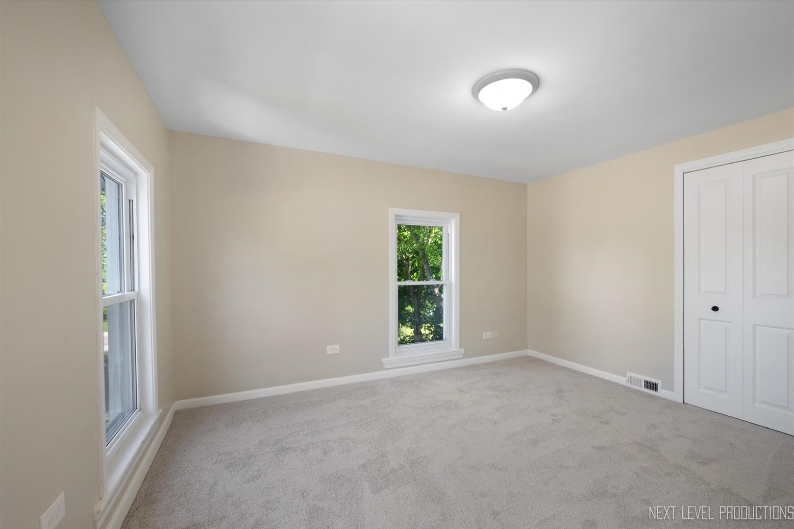 201 South Gilbert Street South Elgin, IL 60177 - Photo 19 of 27 an empty room with windows and closet