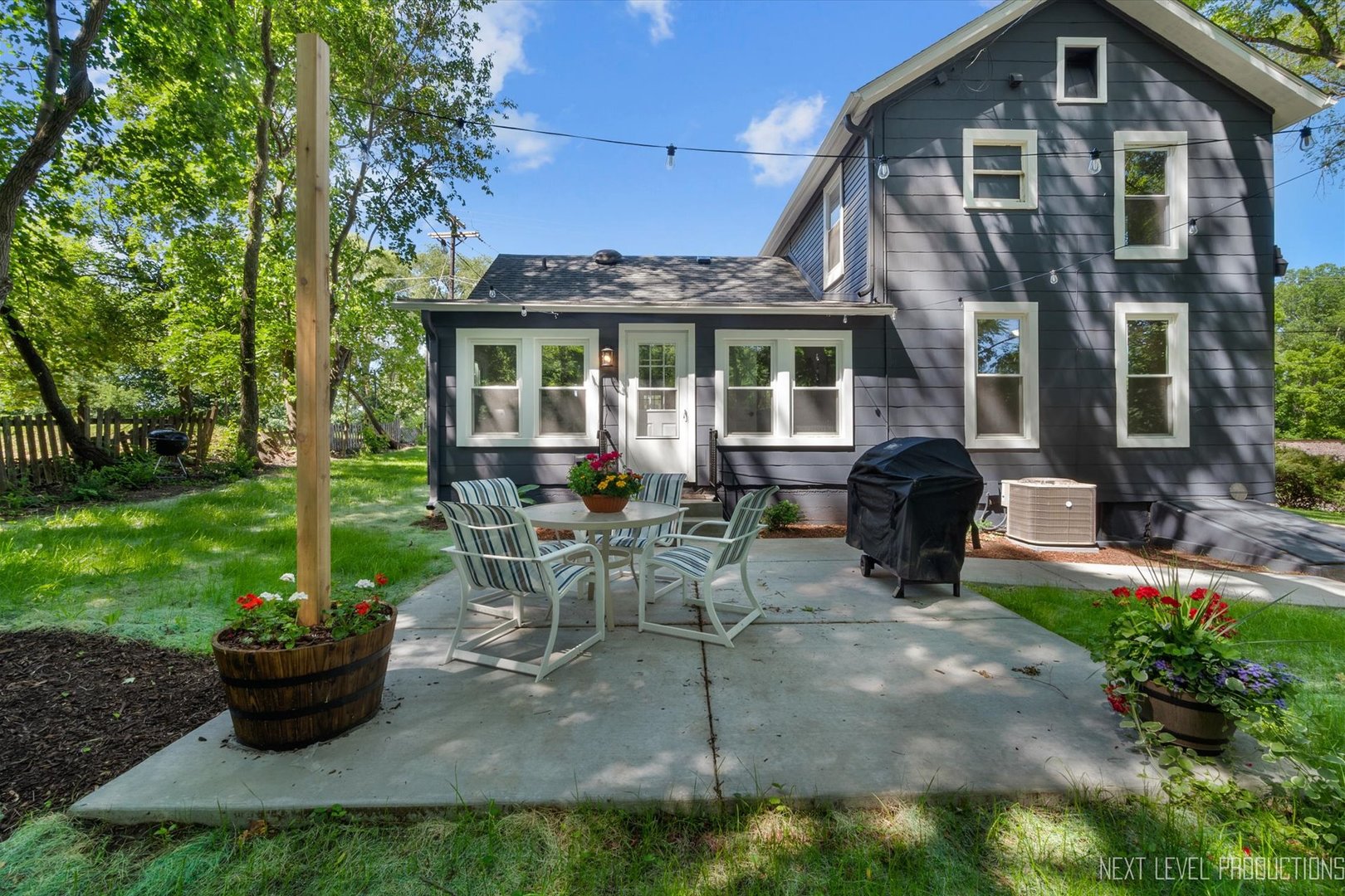 201 South Gilbert Street South Elgin, IL 60177 - Photo 25 of 27 a view of a house with backyard sitting area and garden