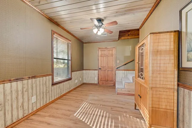 a view of entryway with stairs and wooden floor