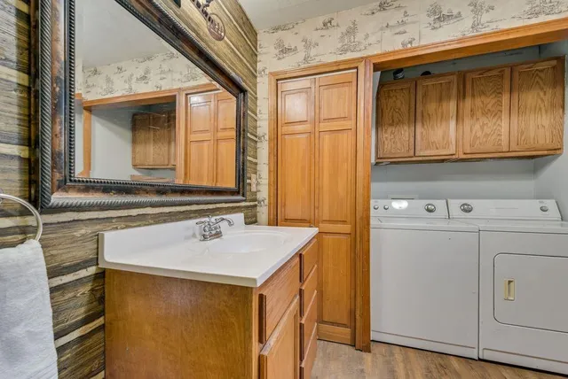 a utility room with dryer and washer