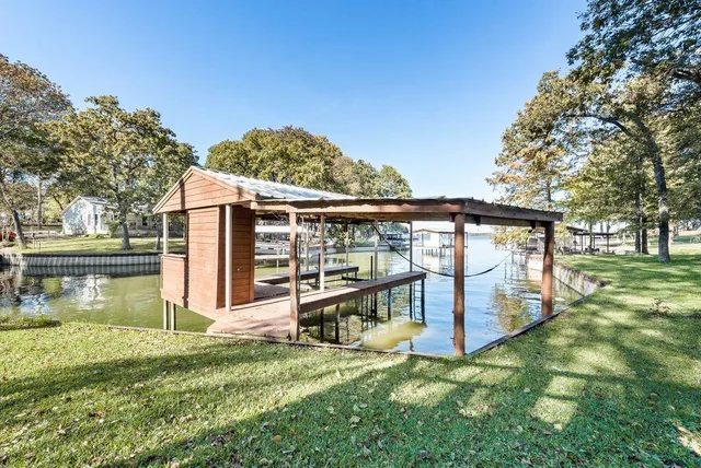 a view of a swimming pool with a patio