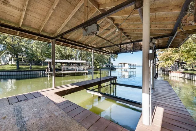 a view of a swimming pool with seating area
