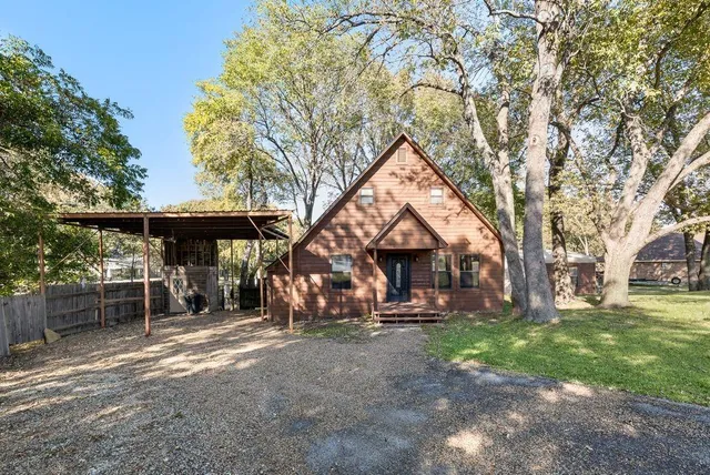 a backyard of a house with an outdoor space