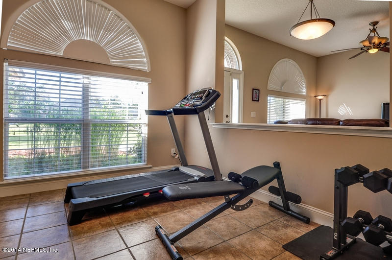 55108 Bear Run Road Callahan, FL 32011 - Photo 15 of 33 a view of a room with gym equipment
