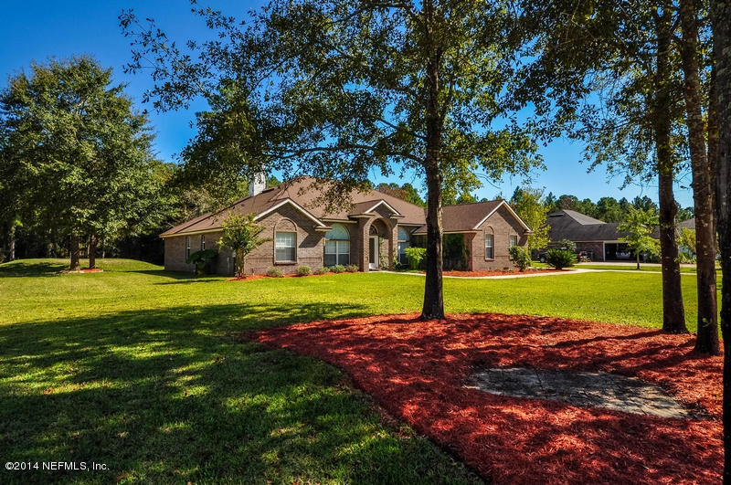 55108 Bear Run Road Callahan, FL 32011 - Photo 31 of 33 a view of swimming pool and green space