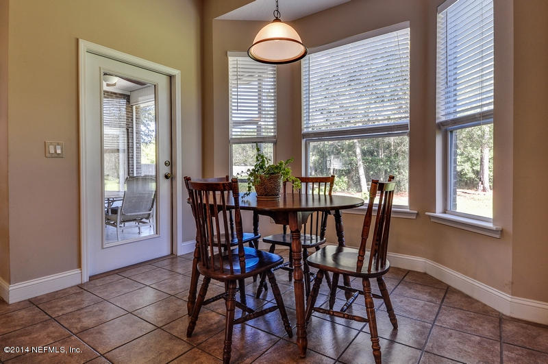 55108 Bear Run Road Callahan, FL 32011 - Photo 10 of 33 a view of a dining room with furniture and window