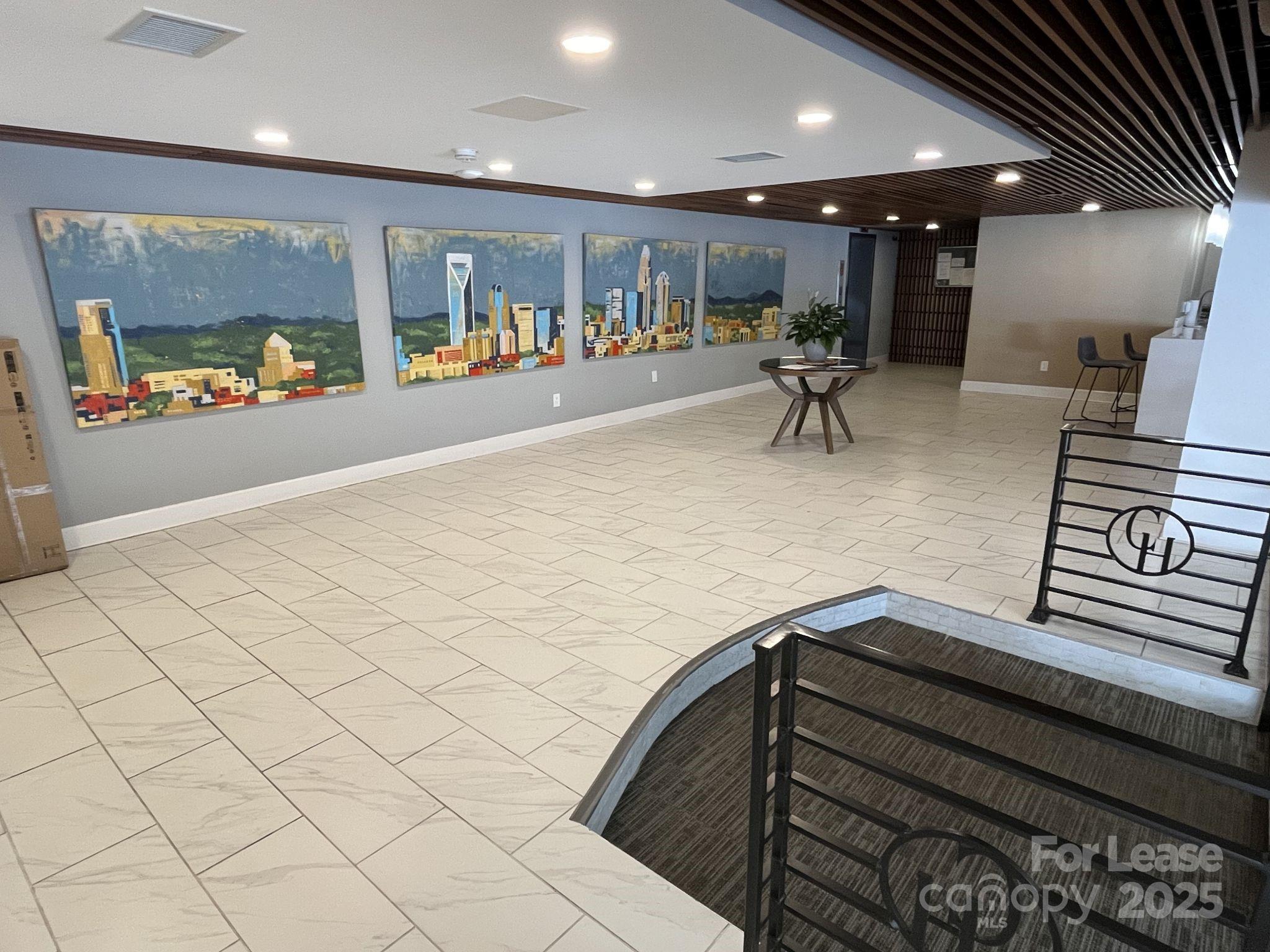 1323 Queens Road, Unit 312 Charlotte, NC 28207 - Photo 26 of 32 a view of a room with gym equipment