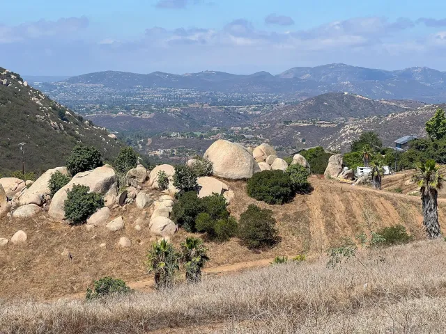 a view of a backyard of a house