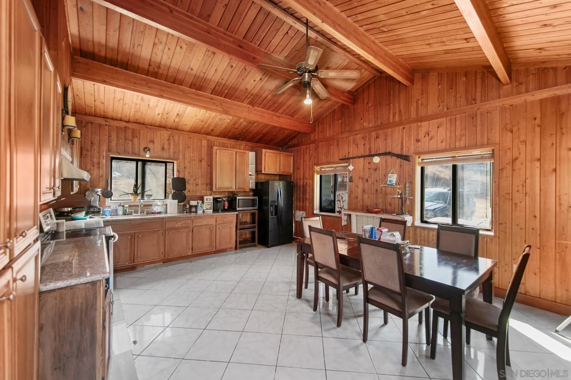 15950 Green Valley Heights Road Ramona, CA 92065 - Photo 6 of 27 a dining area with furniture and a kitchen view