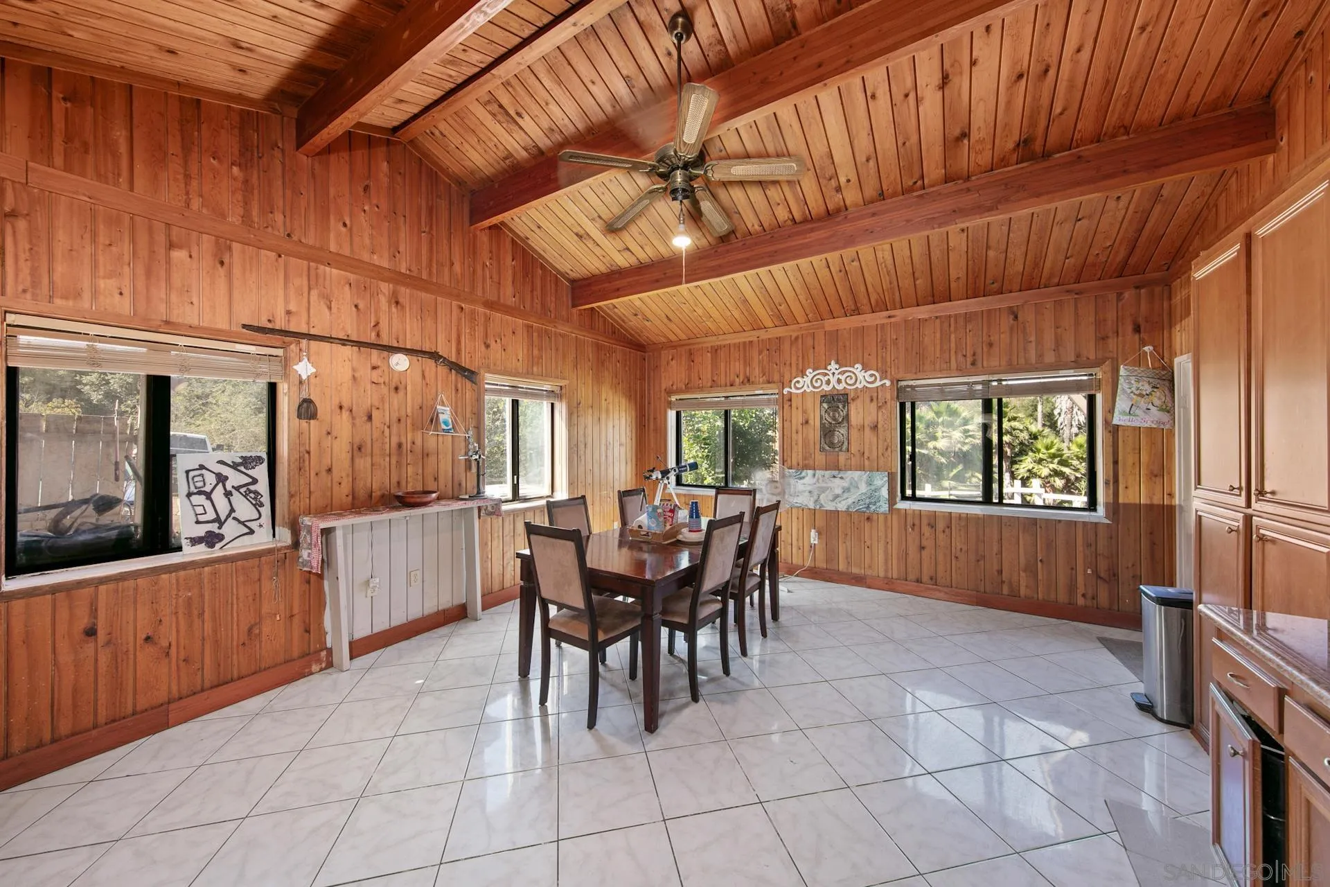 15950 Green Valley Heights Road Ramona, CA 92065 - Photo 7 of 27 a dining room with furniture and chandelier