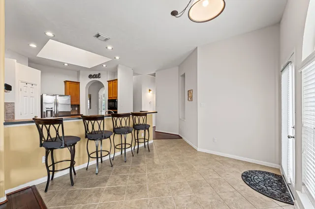 a view of a dining room with furniture