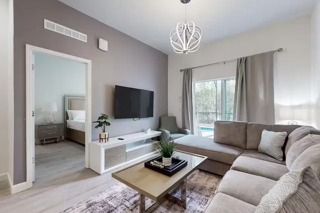a view of a dining room with furniture window and outside view