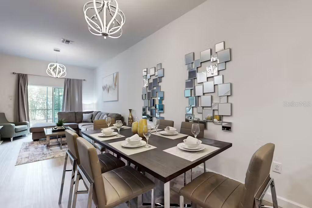 372 Famagusta Drive Davenport, FL 33896 - Photo 6 of 38 a view of a dining room with furniture window and outside view