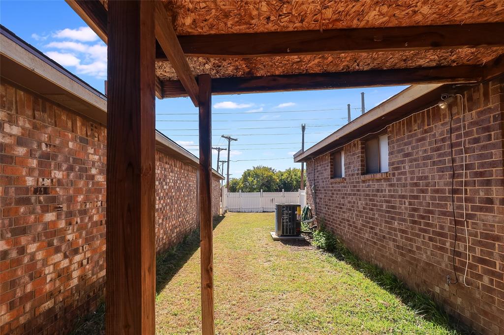1728 Hackamore Street Mesquite, TX 75149 - Photo 19 of 22 Side yard showing new Trane AC!