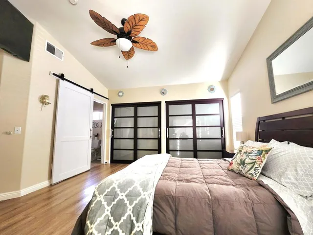 a view of a livingroom with a flat screen tv