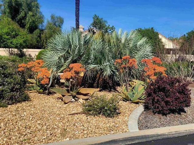 a outdoor dining space with furniture