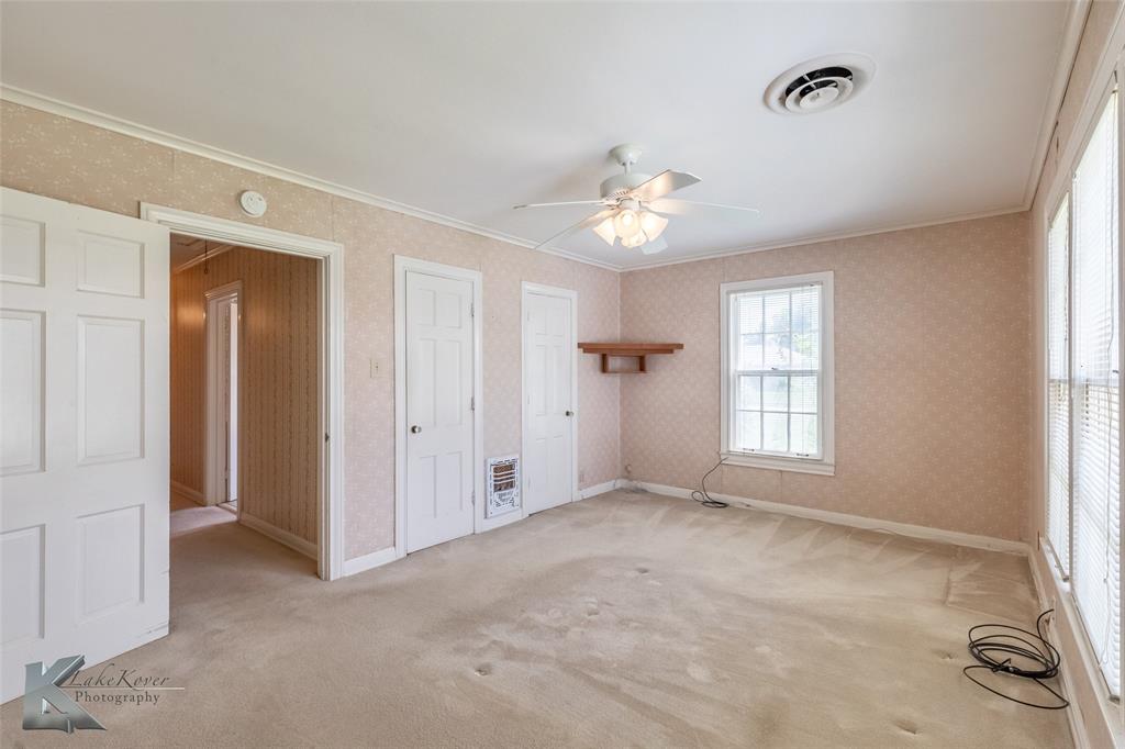 907 North Ave G Haskell, TX 79521 - Photo 14 of 40 a view of an empty room with a window