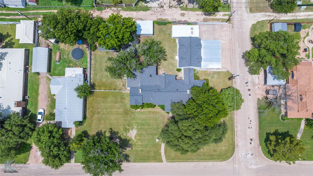 907 North Ave G Haskell, TX 79521 - Photo 37 of 40 an aerial view of multiple houses with yard