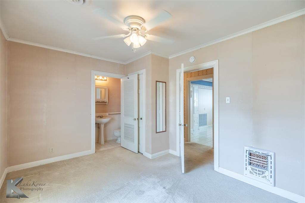 907 North Ave G Haskell, TX 79521 - Photo 10 of 40 a view of an empty room with a bathroom