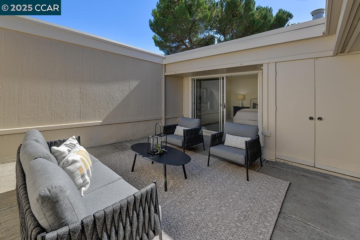 2041 Golden Rain Road, Unit 4 Walnut Creek, CA 94595 - Photo 13 of 53 a living room with furniture