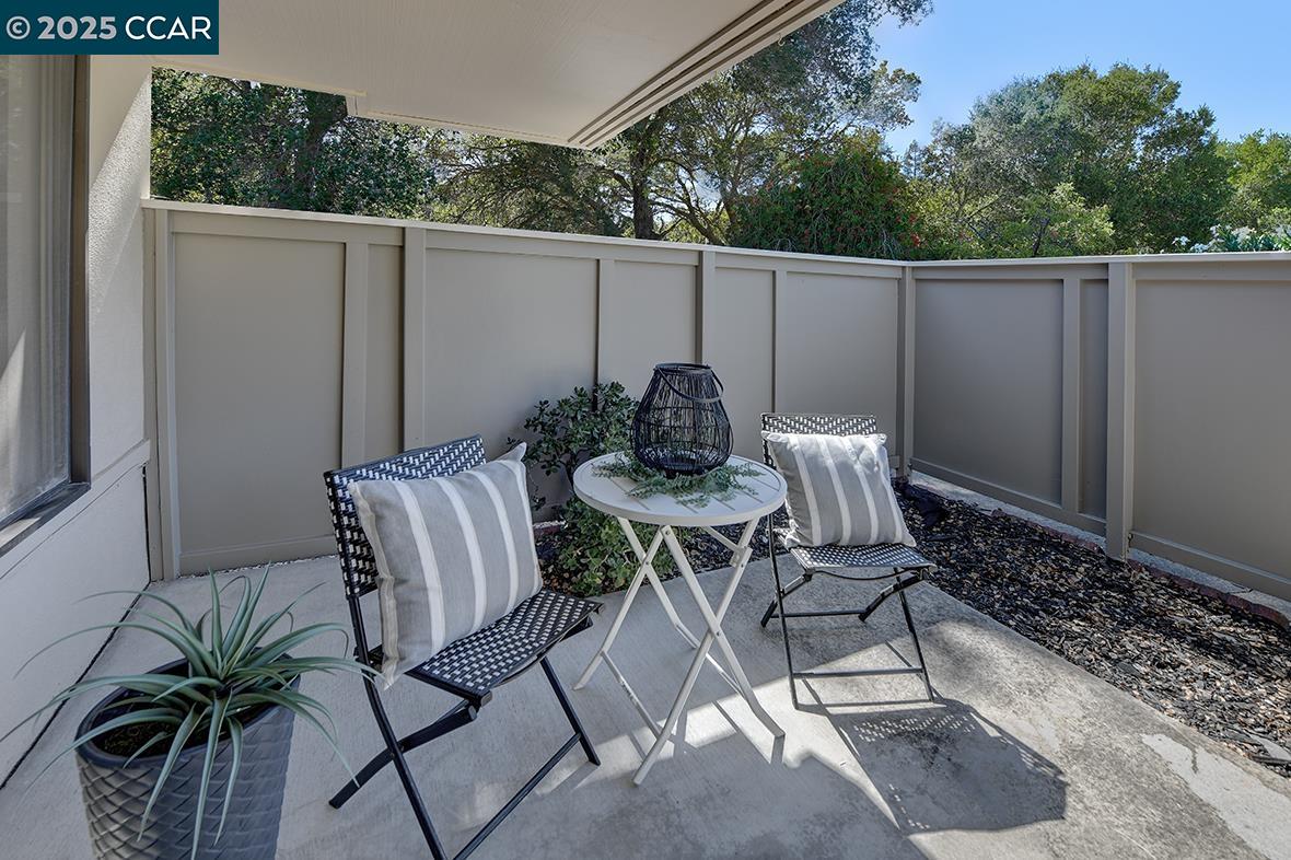 2041 Golden Rain Road, Unit 4 Walnut Creek, CA 94595 - Photo 3 of 53 a view of a backyard with furniture and garden