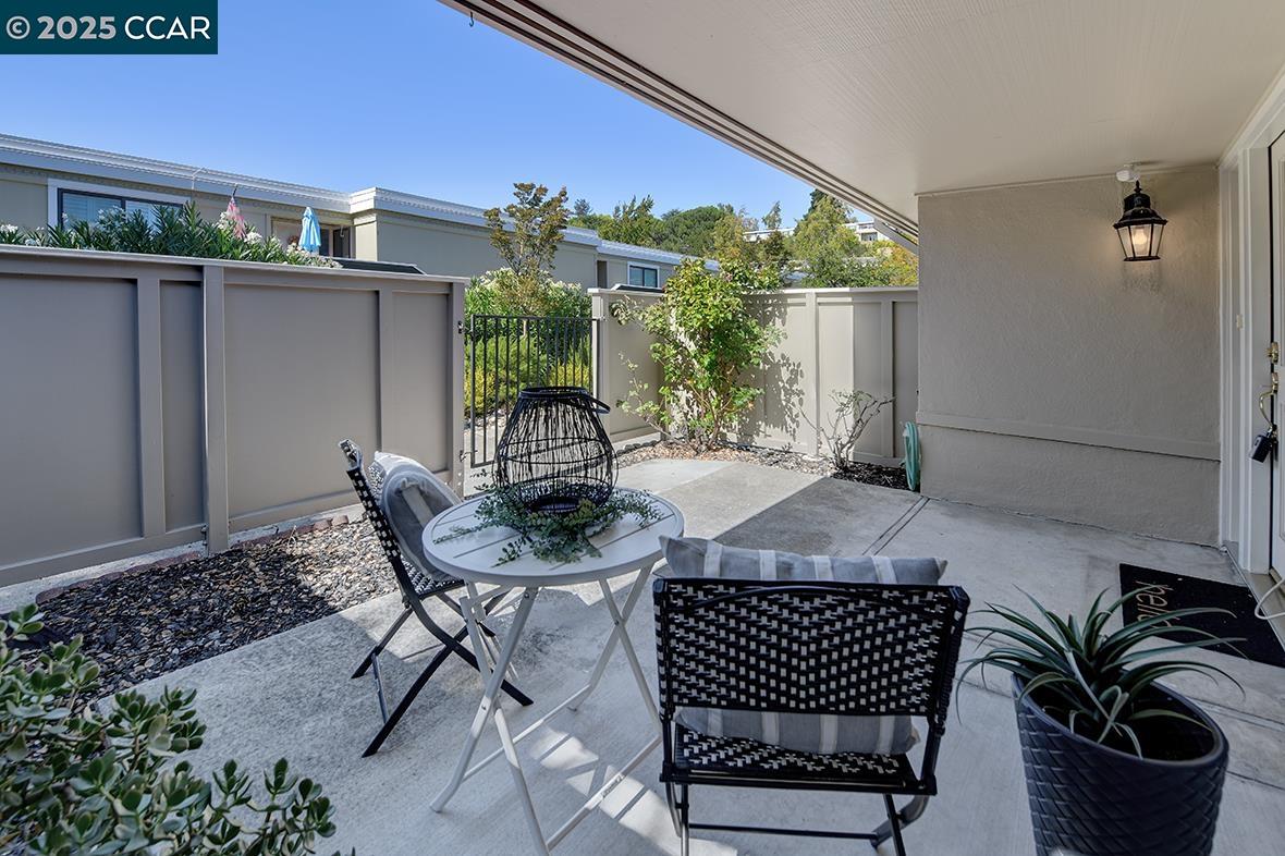 2041 Golden Rain Road, Unit 4 Walnut Creek, CA 94595 - Photo 38 of 53 a view of a chairs and table in patio
