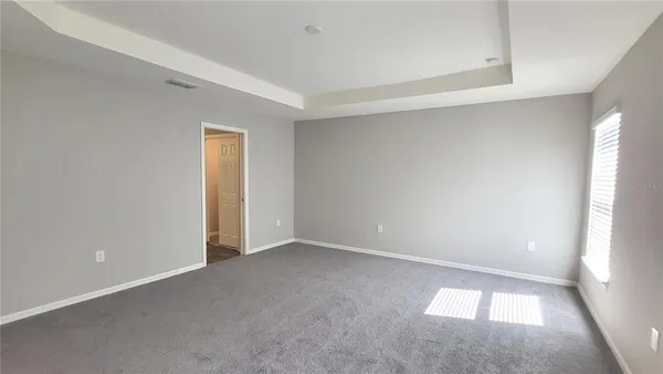 a bathroom with a double vanity sink and mirror