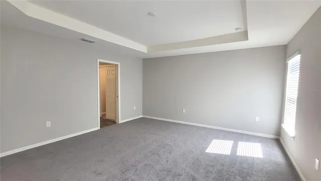 a bathroom with a double vanity sink and mirror
