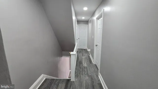 a view of hallway with walk in closet
