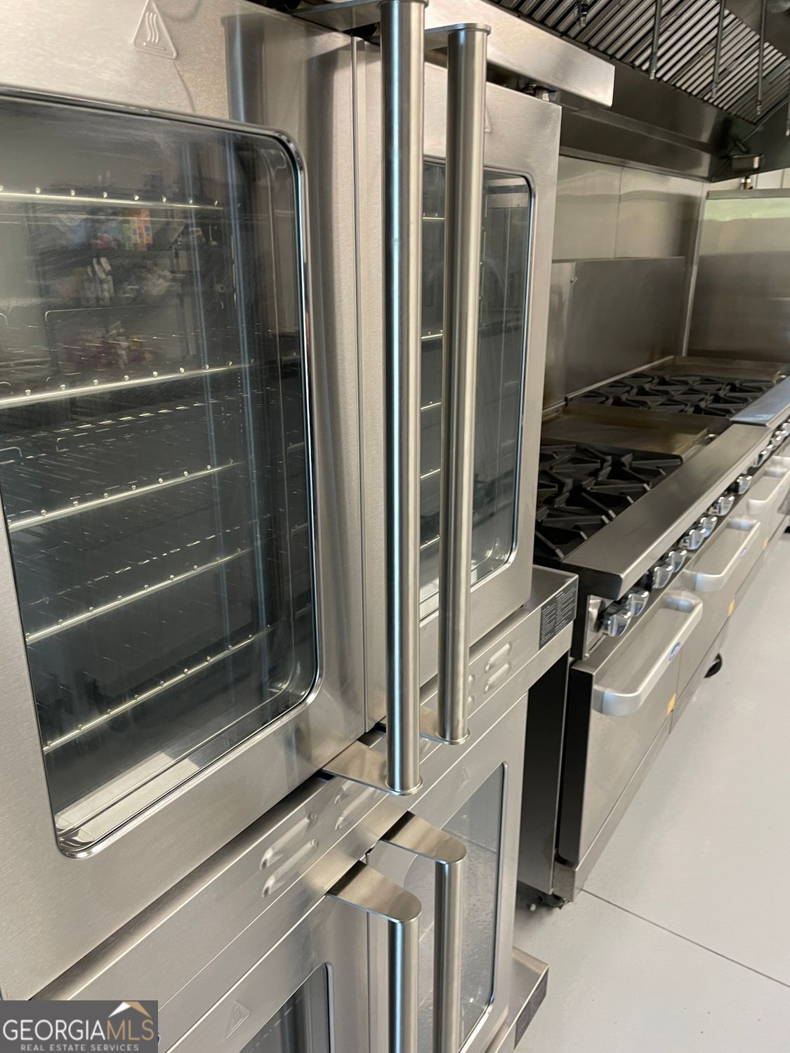 1019 Hardscrabble Road Mineral Bluff, GA 30559 - Photo 16 of 52 a kitchen with a refrigerator and a stove