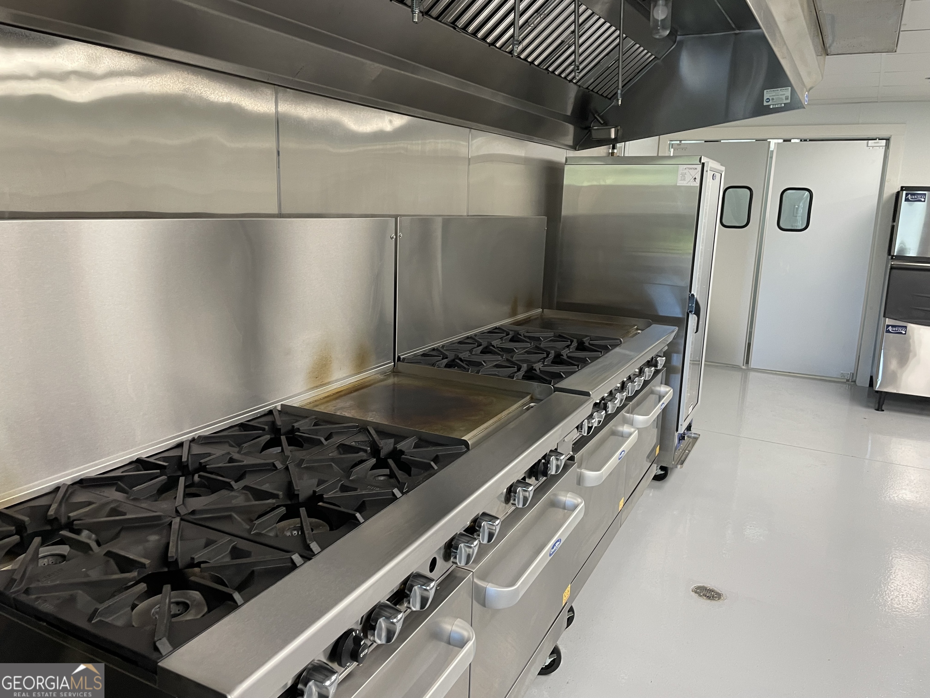 1019 Hardscrabble Road Mineral Bluff, GA 30559 - Photo 19 of 52 a stove top oven sitting inside of a kitchen