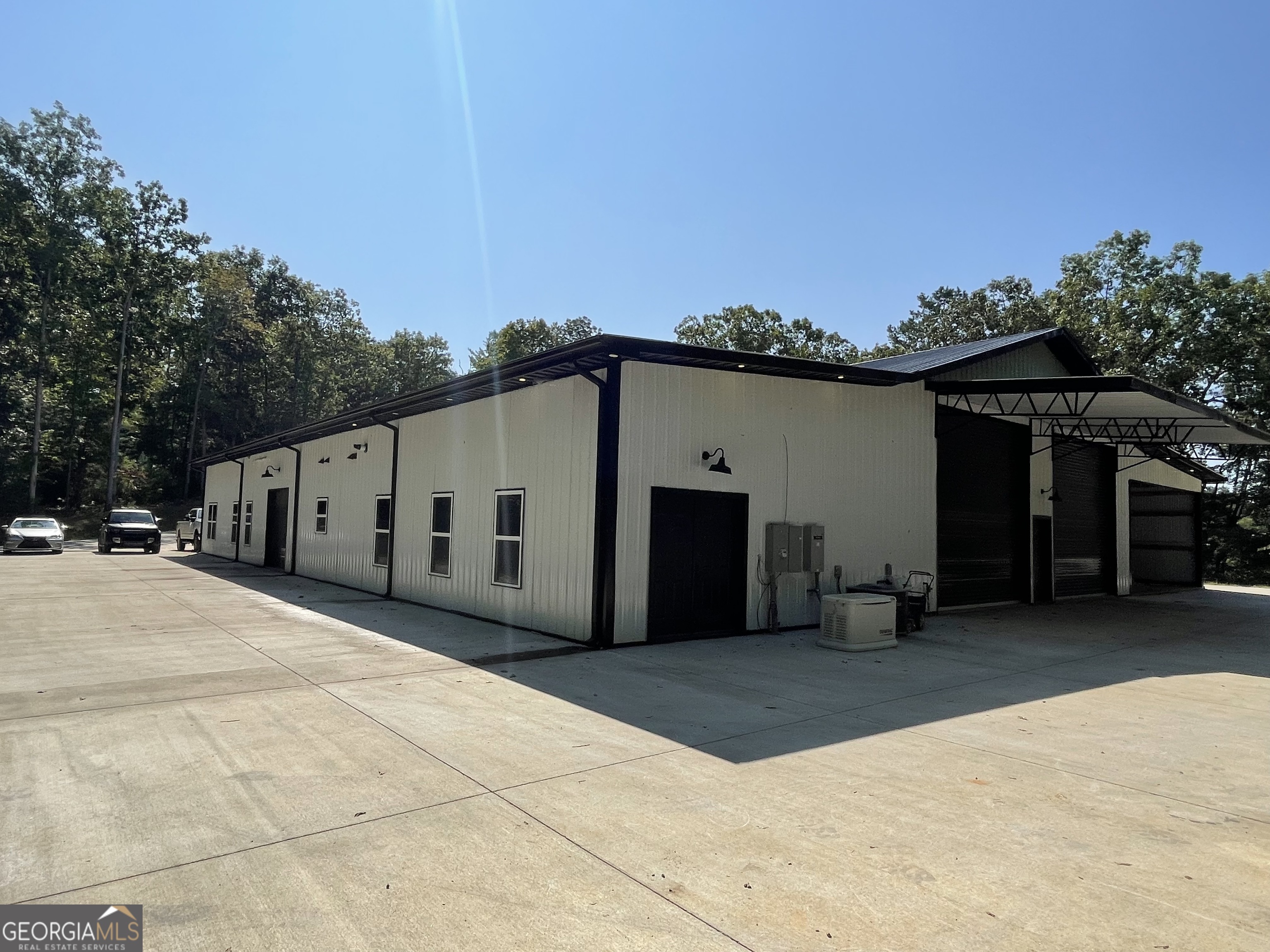 1019 Hardscrabble Road Mineral Bluff, GA 30559 - Photo 23 of 52 a front view of a house with a yard and garage
