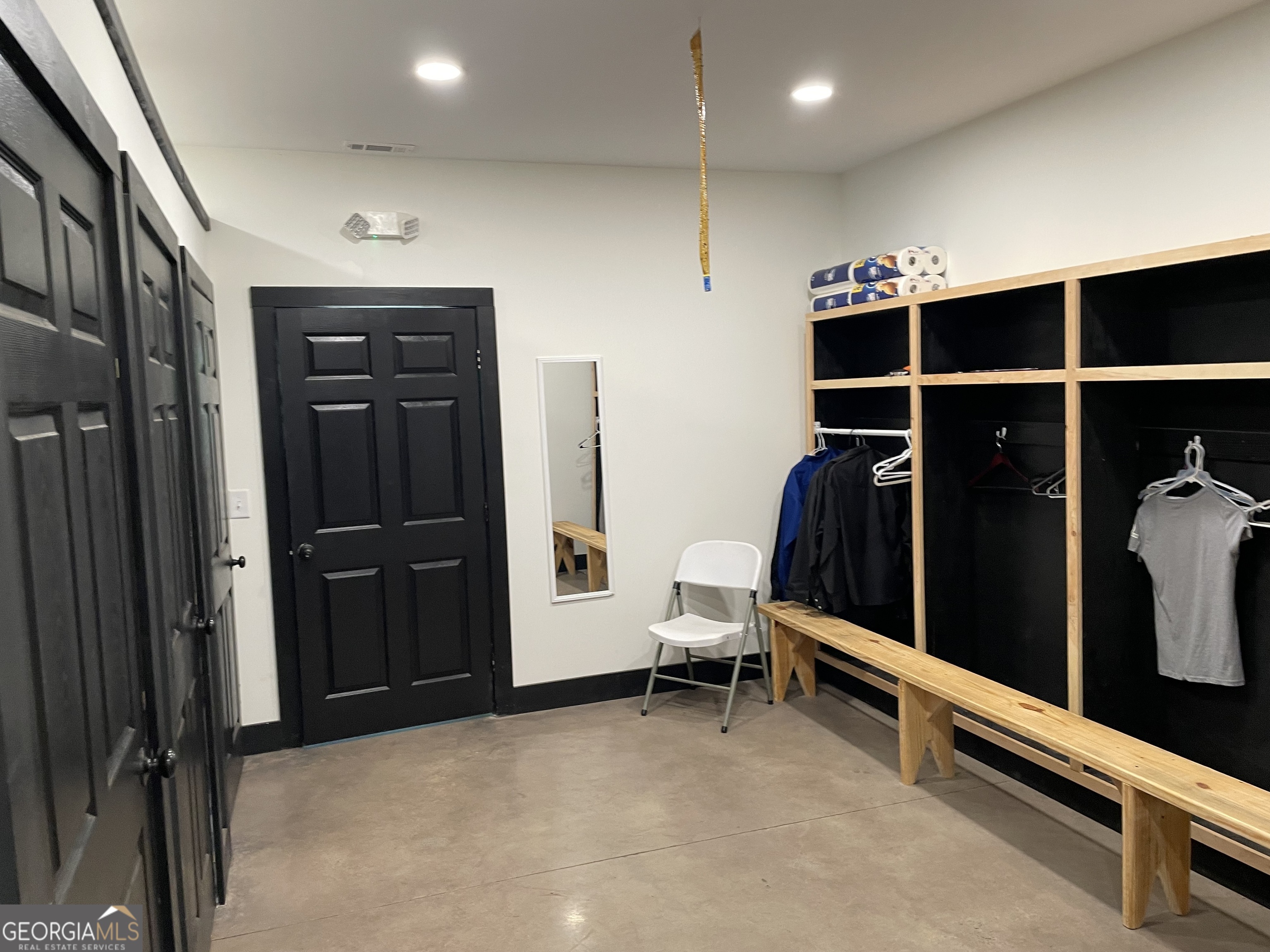 1019 Hardscrabble Road Mineral Bluff, GA 30559 - Photo 28 of 52 a view of walk in closet with clothes and shoes
