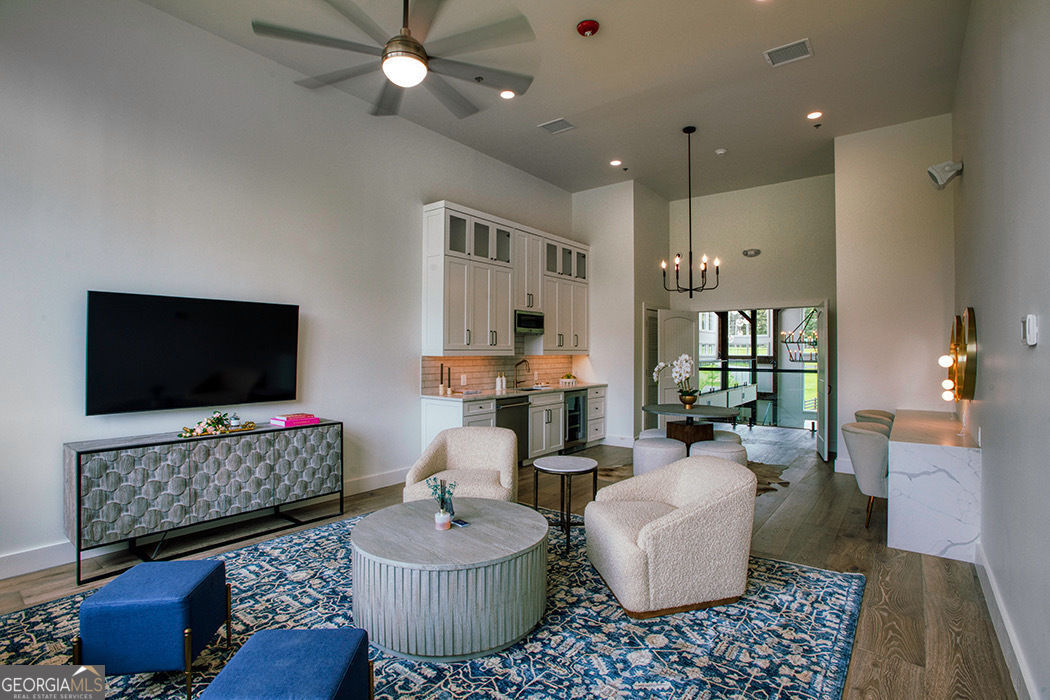 1019 Hardscrabble Road Mineral Bluff, GA 30559 - Photo 5 of 52 a living room with furniture and a flat screen tv