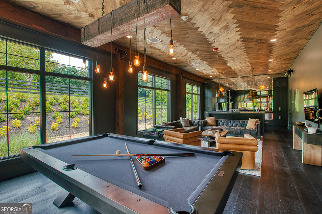1019 Hardscrabble Road Mineral Bluff, GA 30559 - Photo 9 of 52 a living room with furniture and a large window