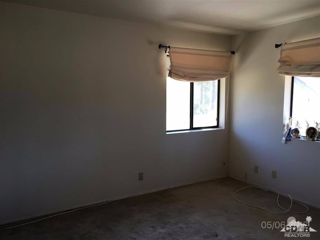 59371 Devils Ladder Road Mountain Center, CA 92561 - Photo 8 of 12 an empty room with a window