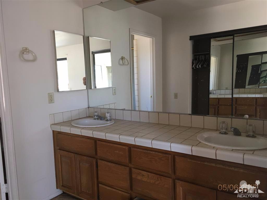 59371 Devils Ladder Road Mountain Center, CA 92561 - Photo 10 of 12 a bathroom with a sink and a mirror