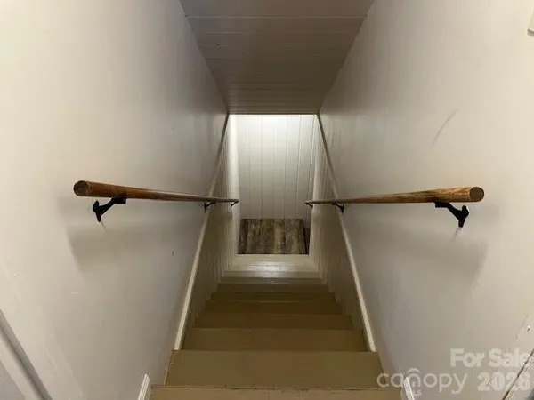 a view of a bathroom from a hallway